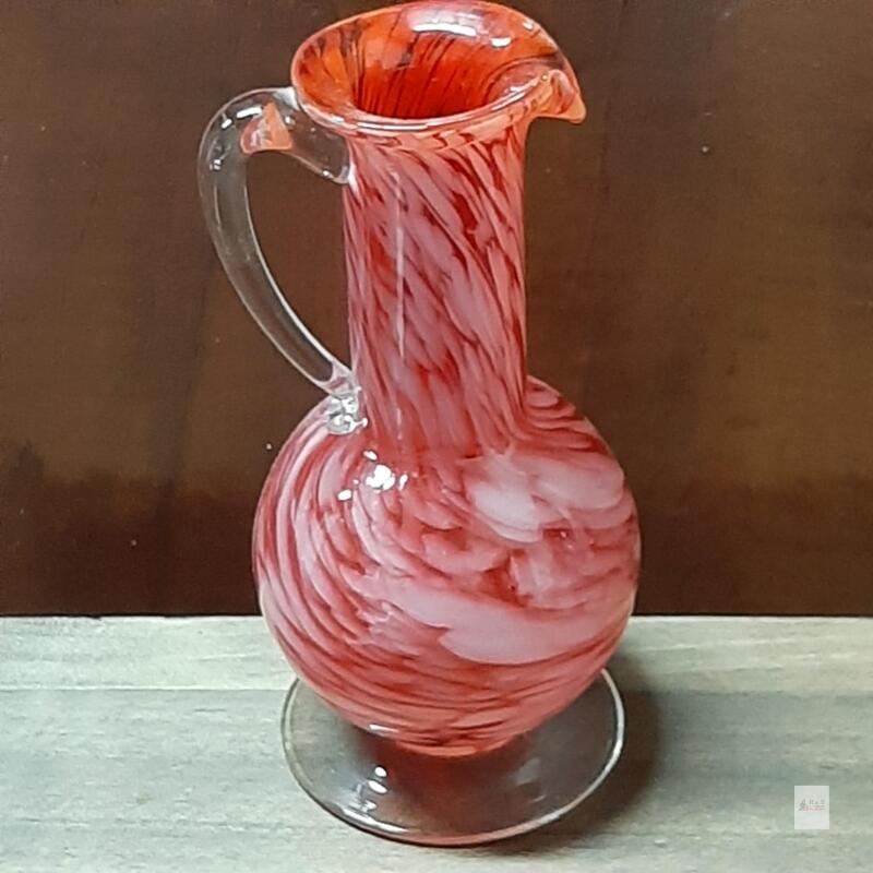 Hand-Blown Art Glass Pitcher/Vase with Red and White Swirl Design, Clear Handle, and Flared Mouth