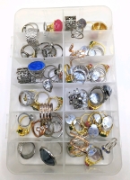 Collection of Unverified Rings in Organizer Tray.