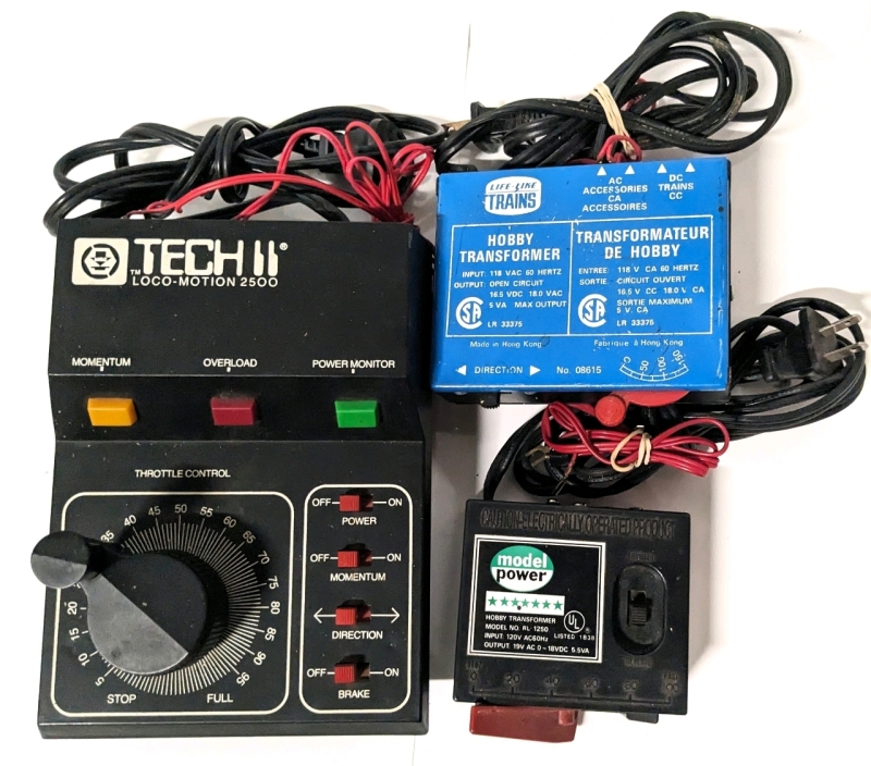 3 Vintage HO Scale Hobby Transformers: TECH II Loco-Motion 2500, Life-Like Trains #:08615 & Model Power RL-1250.