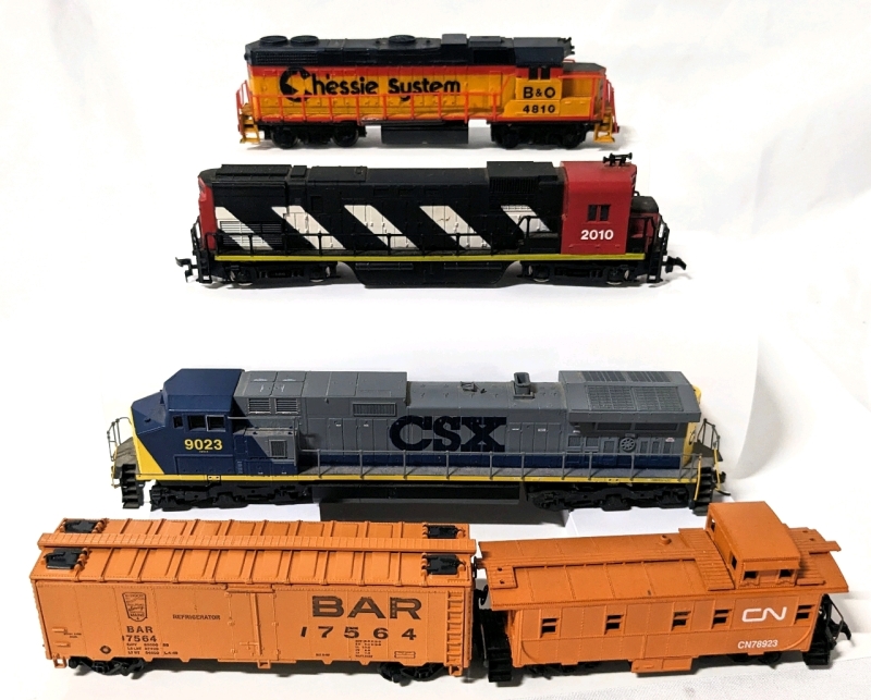 HO Scale Model Trains: 3 Locomotive Engines, 1 Train Car & 1 Caboose.