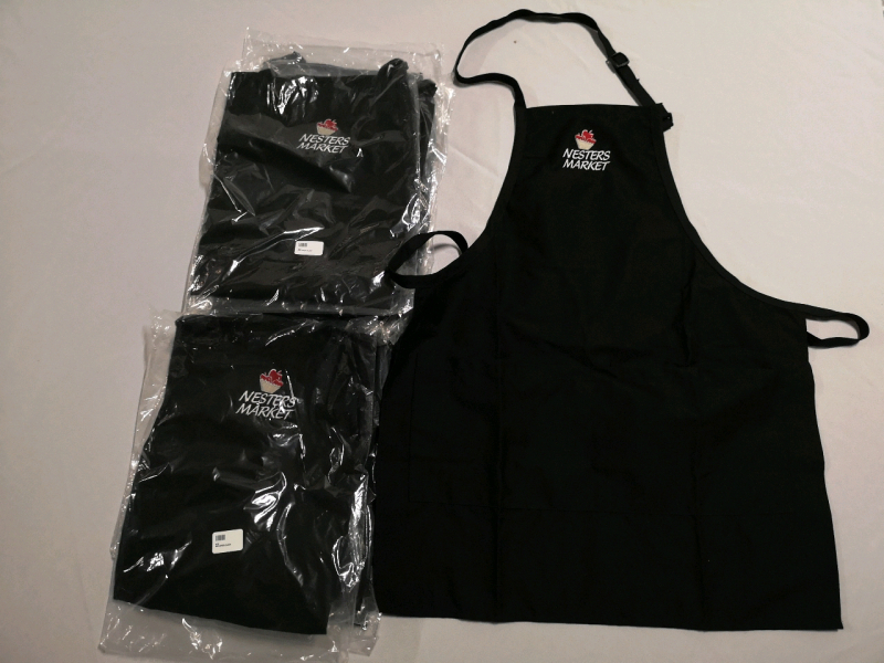 9 New Aprons - Logo Nesters Market
