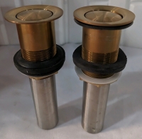 2 Metal Pop Up Drain Plugs.