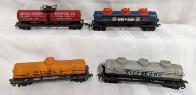 4 HO Scale Advertising Tankers.