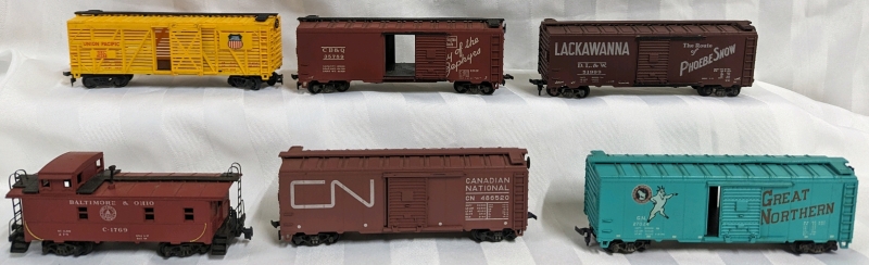 6 Toy Train Cars - HO Scale