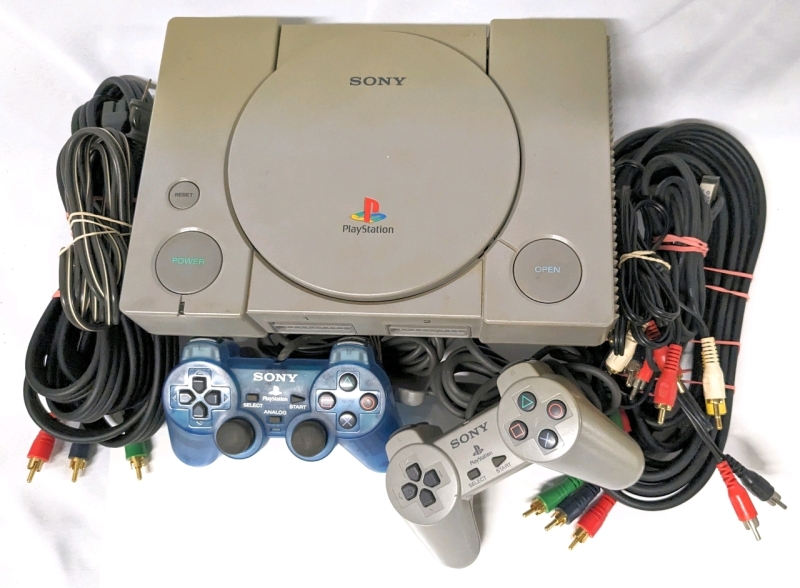 Vintage 1997 Sony PlayStation SCPH-5501 with 2 controllers & AV Cables