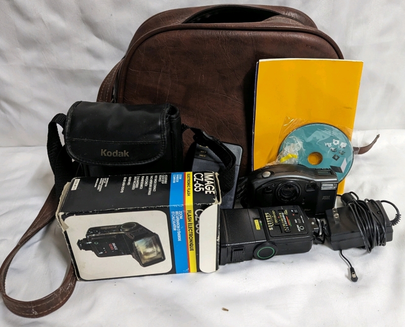 Kodak DC210 Digital Camera with Bag and Miscellaneous Accessories.