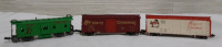 Vintage, 1 Con-Car Christmas Caboose and 2 Con-Cor Christmas Boxcars. N Gauge