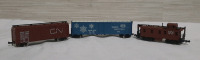 Vintage, 2 Boxcars and 1 Caboose. All 00 Gauge