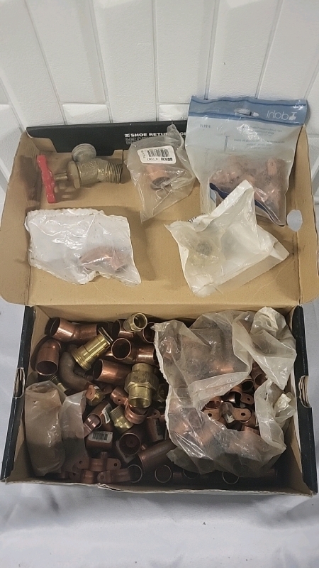 Shoebox Filled with Pipe Fittings