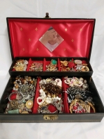 Vintage jewelry box with contents