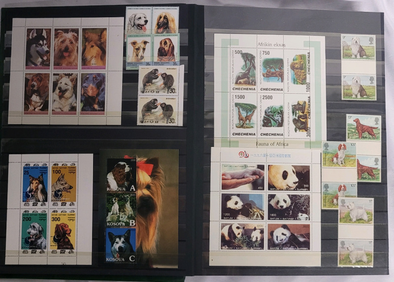 World Stamp Lot in Stamp Binder, Majority are Animals - Used / Unused, Blocks & Singles