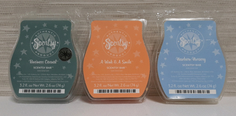 3 Partial Packages of Scentsy Bars, 1 Business Casual, 1 Wink and a Smile and 1 Newborn Nursery.