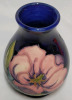 MOORCROFT ' Clematis ' Vase , Made in England . Measures 4" tall - 3