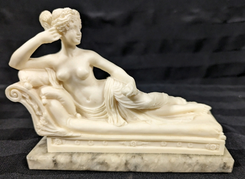 Stoneware Statue of a Lounging Woman.