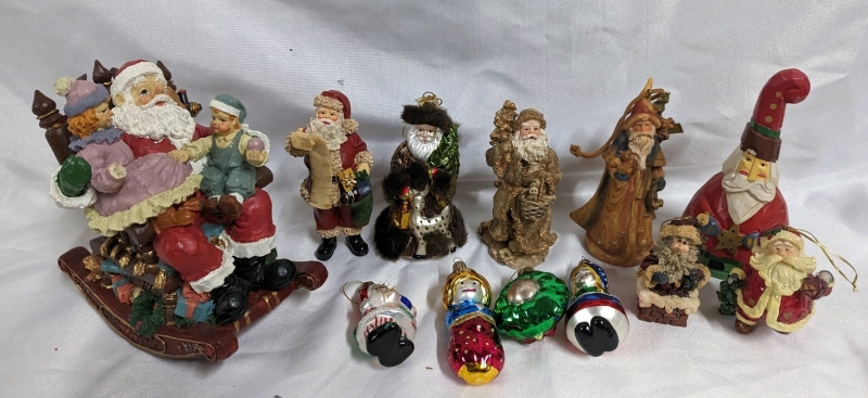A Group of Santa's and Other Christmas Ornaments.