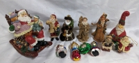 A Group of Santa's and Other Christmas Ornaments.