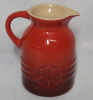 Le Creuset Cerise Syrup Jar , Measures 4" Tall . No chips or cracks