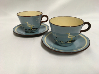 Two Torquay Pottery Cups & Saucers