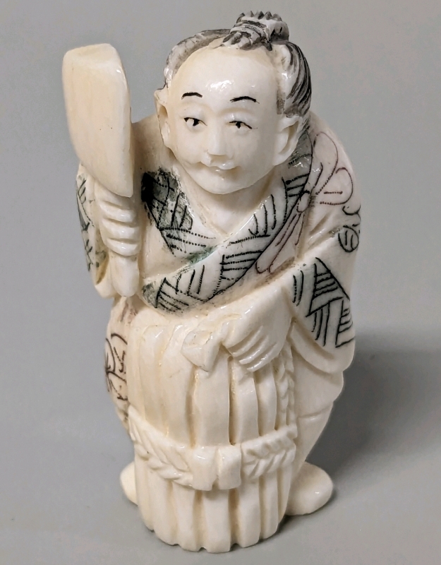 Antique Ivory Colored Netsuke Woodcutter