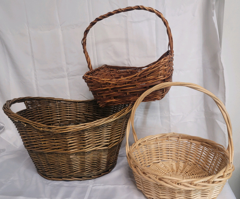 Three (3) Various Size Baskets , One would be great for Laundry