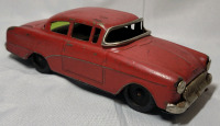 Vintage OPEL Tin Friction Car , measures 5.5"&times;2" . Friction Back Wheels Not Working