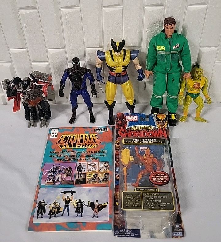 6 Action Figures & A Collectors Magazine