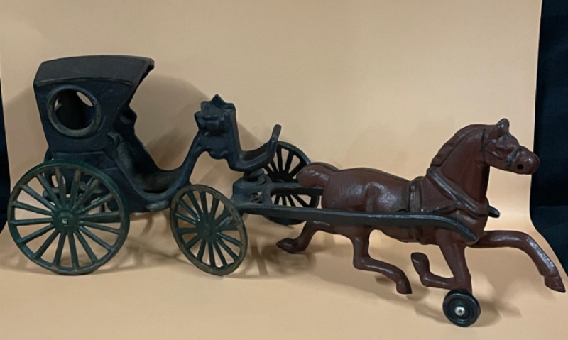 Cast iron horse drawn carriage