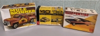 3 model cars/trucks. Partially complete.