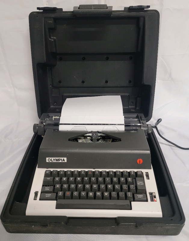 Vintage Olympia Electronic Typewriter in Case . Tested Powers Up , Needs New Ribbon
