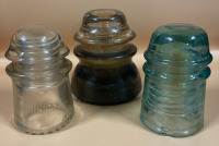 3 Vintage Glass insulators range from 4.5&rdquo; tall to 4&rdquo; tall