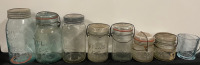 7 Mason Jars and 1 glass measuring cup