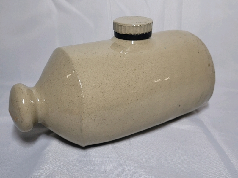 Vintage Stoneware Bed Warmer , measures 9" Long . No cracks