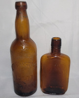 Vintage Amber Bottles , measures 6.5" & 9 3/4" tall .