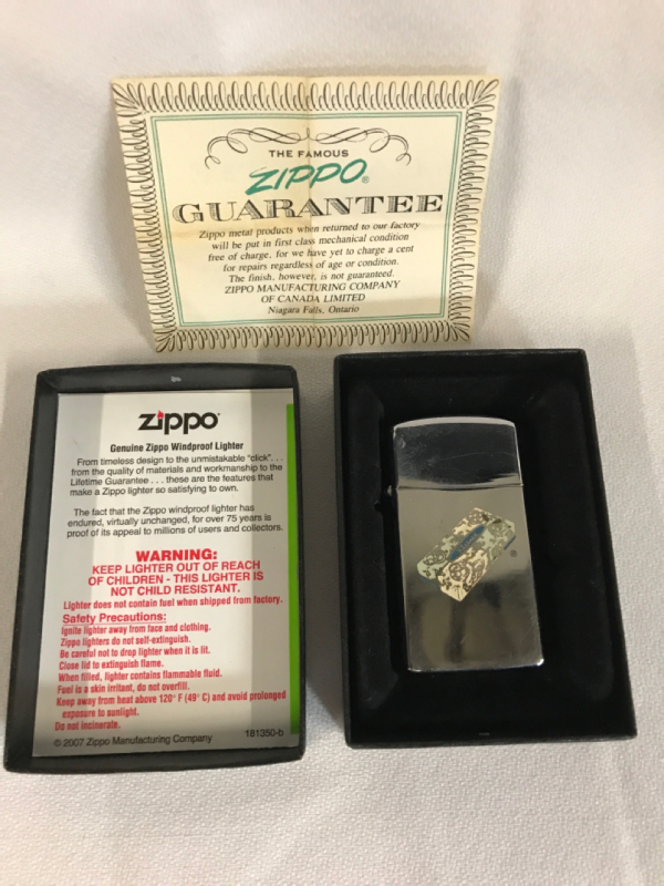 ZIPPO Kleenex Advertising Lighter 2 1/4 inches tall