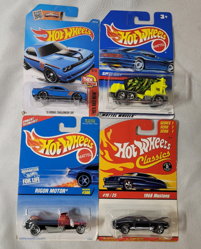 Hot Wheels Diecast Cars in Sealed Package . Four (4) Diecast Cars