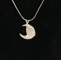 Vintage Sterling Silver Moon Girl Pendant and Chain. The chain is approximately 22" long.