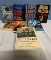 A Collection of 8 Hardcover and Softcover Books.