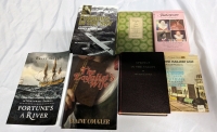 7 Hardcover And Softcover Books.