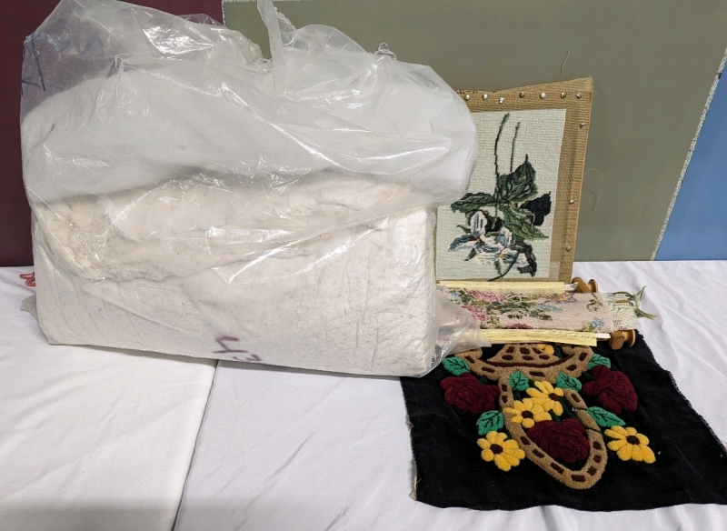 A Collection of crafting supplies and projects, both finished and unfinished.