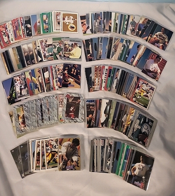 200+ NFL Football Trading Cards in Protective Sleeves