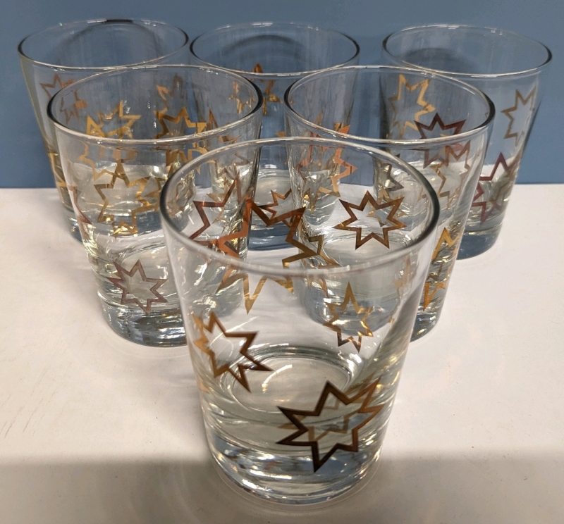 6 MCM Star Holiday Glasses.