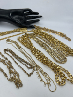 Nine unsorted Gold Tone Chains