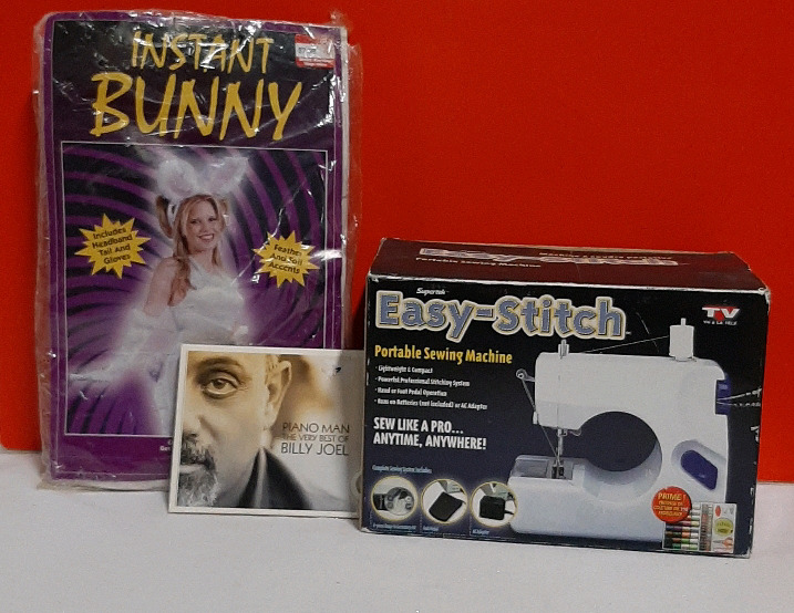 Easy Stitch Sewing Machine, Bunny Costume and a Billy Joel CD.