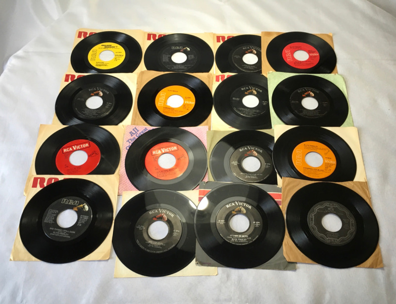 Sixteen Elvis 45 RPM Records