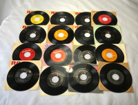 Sixteen Elvis 45 RPM Records