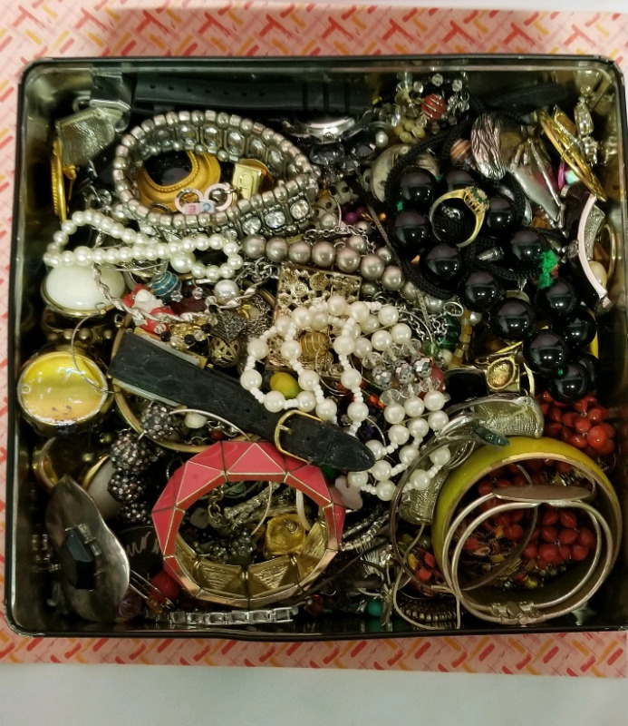 Cookie tin full of vintage to modern jewelry