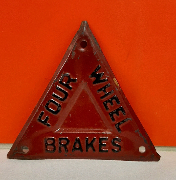 Antique Car Sign Four Wheel Brakes.
