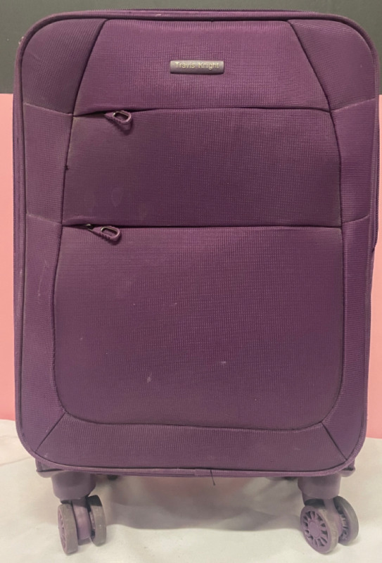 Travis Knight Purple soft cover luggage suitcase