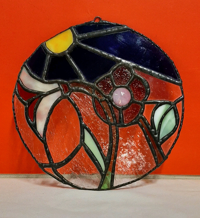 Stained Glass Panel of Sun and Flowers