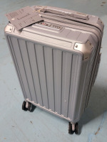 New - LuggeX Silver Carry-On Luggage on Wheels , Measures 20"&times;15"&times;9 1/4"